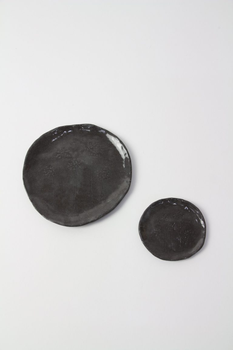 ceramic dishes with plant engraving