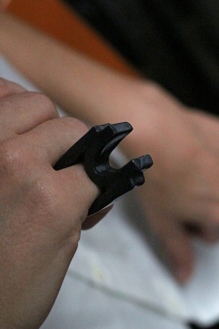 hand wearing ceramic ring