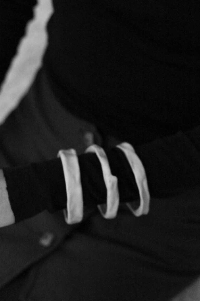 arm wearing ceramic bracelets
