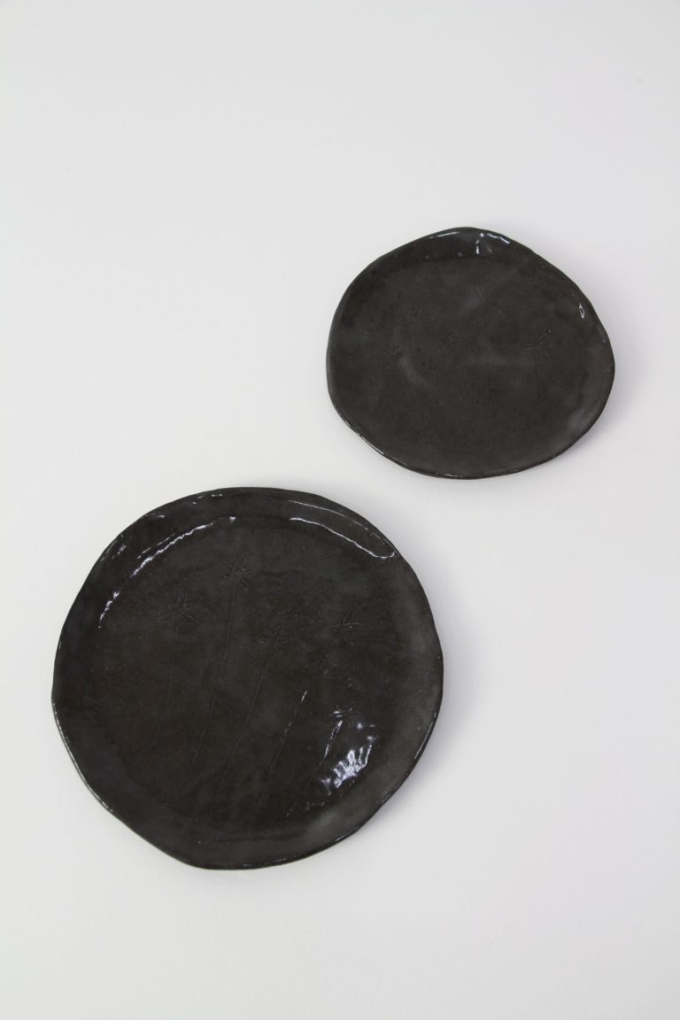 ceramic dishes with plant engraving