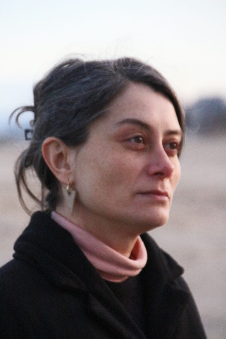 woman wearing ceramic earring hanger
