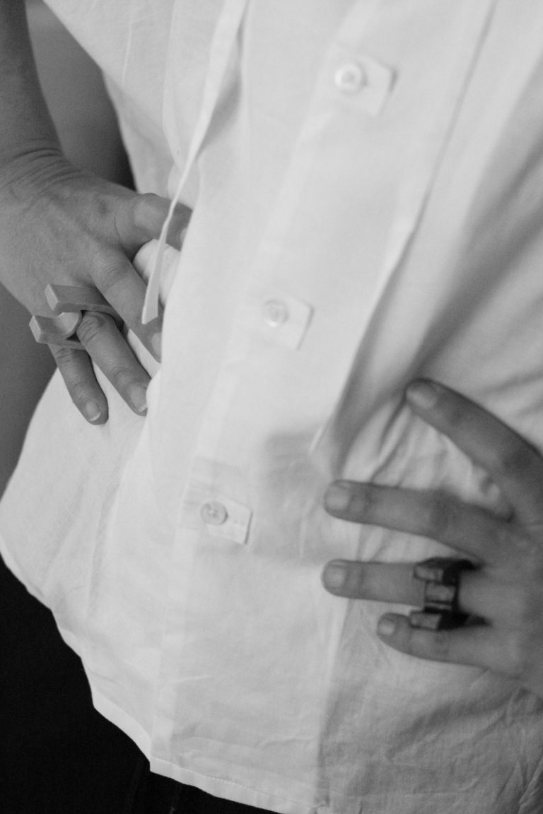 hands wearing ceramic rings