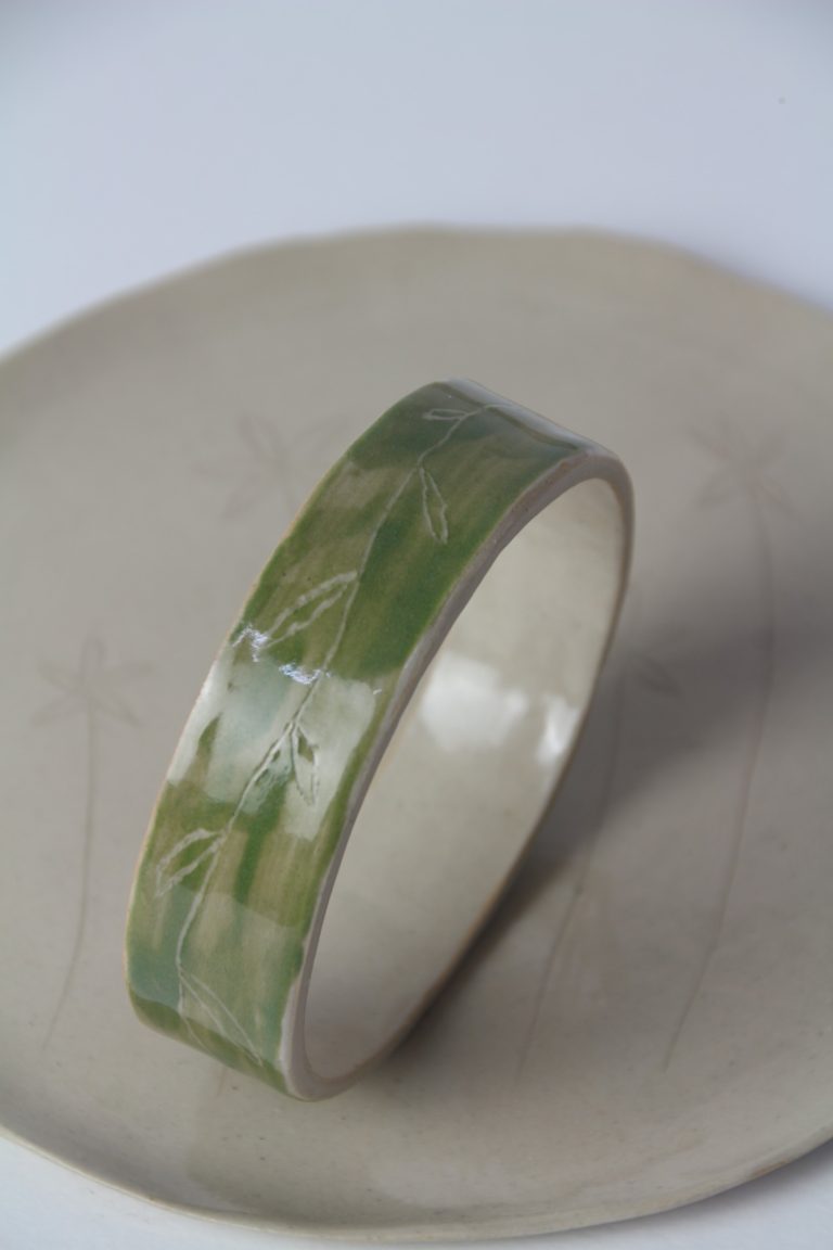 ceramic bracelet on a dish