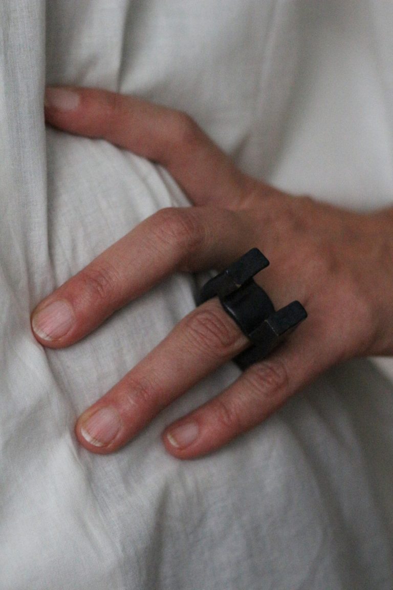 hand wearing ceramic ring