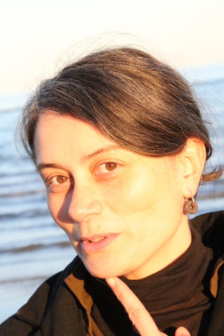 woman wearing ceramic earring hangers