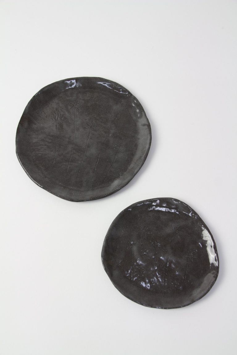 ceramic dishes with plant engraving