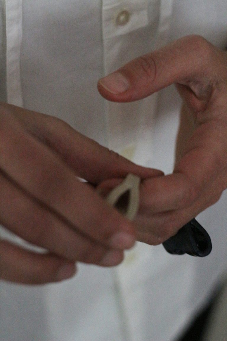 hand wearing ceramic rings