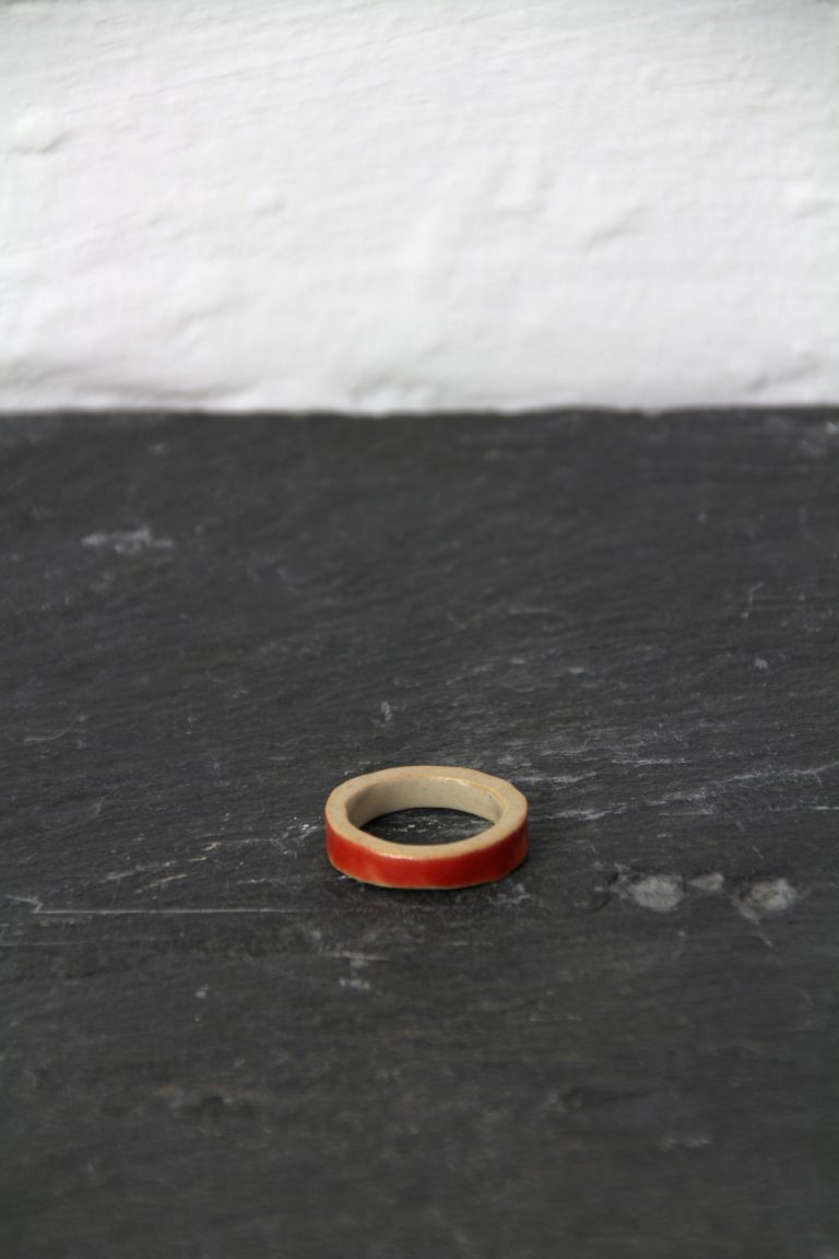 ceramic ring on black stone